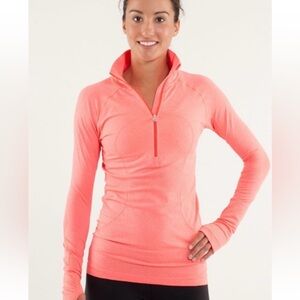 Lululemon Run: Swiftly Tech 1/2 Zip pullover in the color Flare.